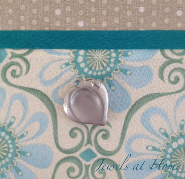 Glue a magnet to the back of a sentimental object, so you can see and use it every day.  {Jewels at Home}