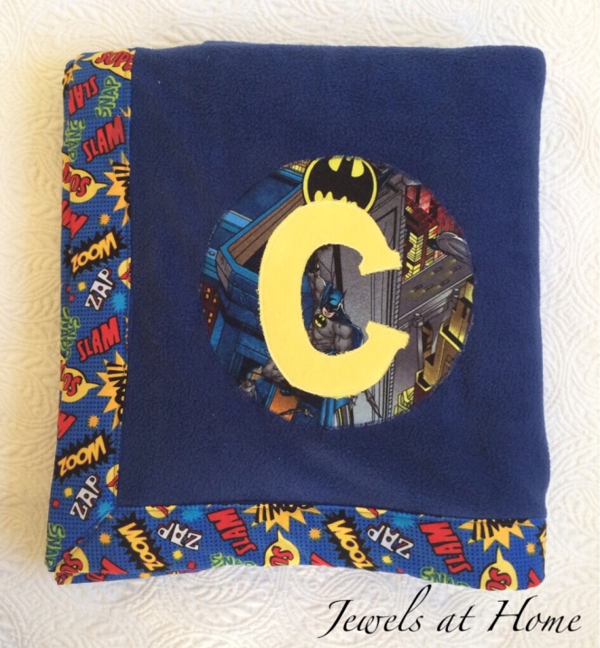 Superhero-themed monogrammed fleece blankets for a boys' sleepover party | Jewels at Home